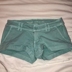 I am selling a pair of blue shorts.